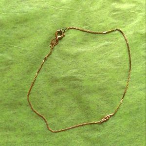 Delicate gold knot bracelet